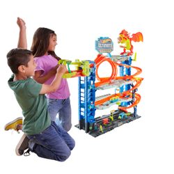 Hot Wheels City Un Dino au Garage, coffret de jeu pour petites voitures à  connecter avec circuit et pistes, jouet pour enfant, GBF91